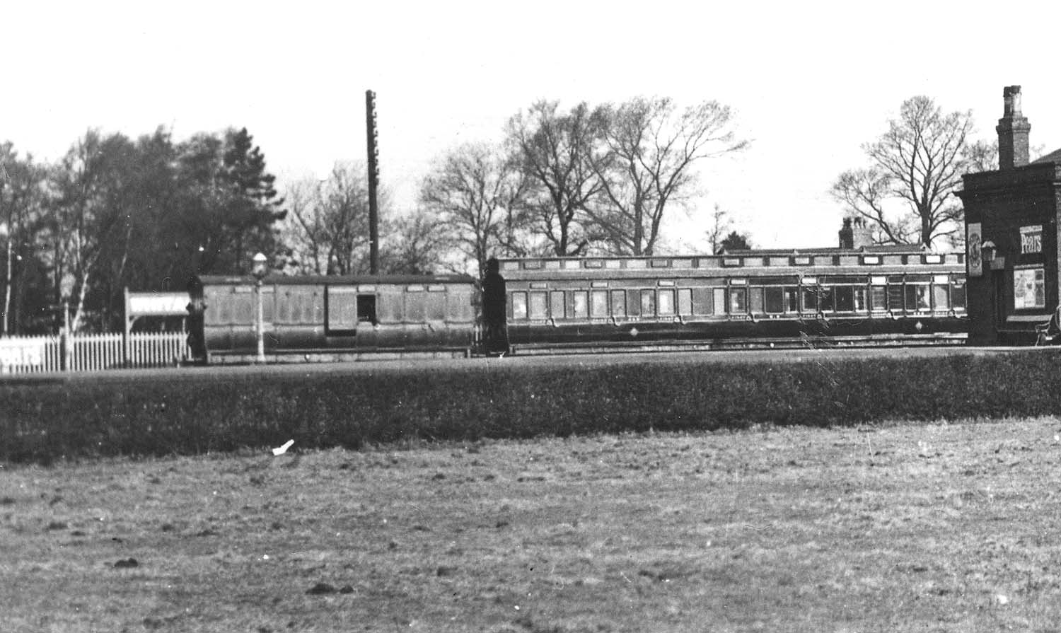 Close up showing the rear two carriages of an express train to either Tamworth or to Leicester via Nuneaton