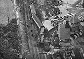 Close up showing the severely damaged railway track and the locomotive No 45699 'Galatea' lying on its side
