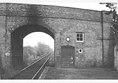 Ex-MR 3F 0-6-0 No 43520 is seen passing Bidford on a goods train made up of an ex-LMS 50' brake, fitted vans and sheeted open wagons