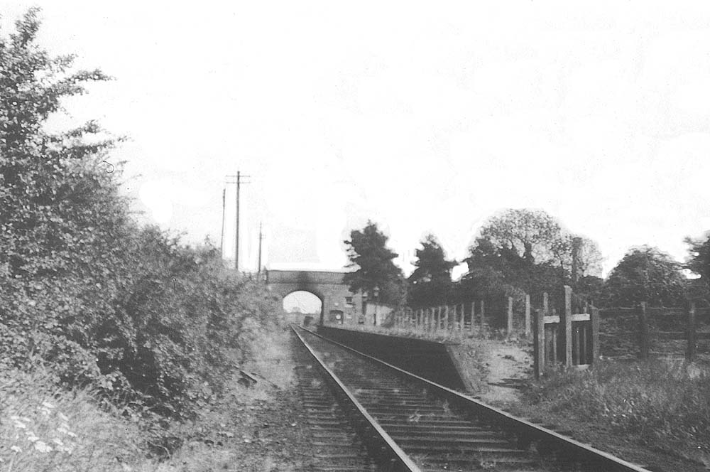 Looking along the length of Bidford station's single platform in the direction of Stratford upon Avon after closure of the station