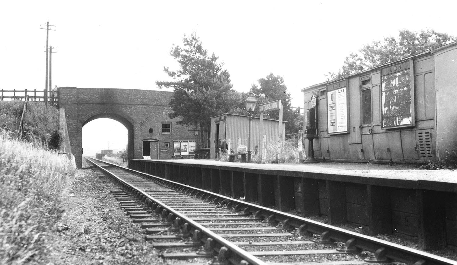 A later view looking towards Stratford upon Avon through the road bridge and showing the huts used by the coal merchants