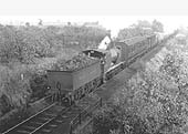 Ex-MR 3F 0-6-0 No 43520 is seen passing Bidford on a goods train made up of an ex-LMS 50' brake, fitted vans and sheeted open wagons