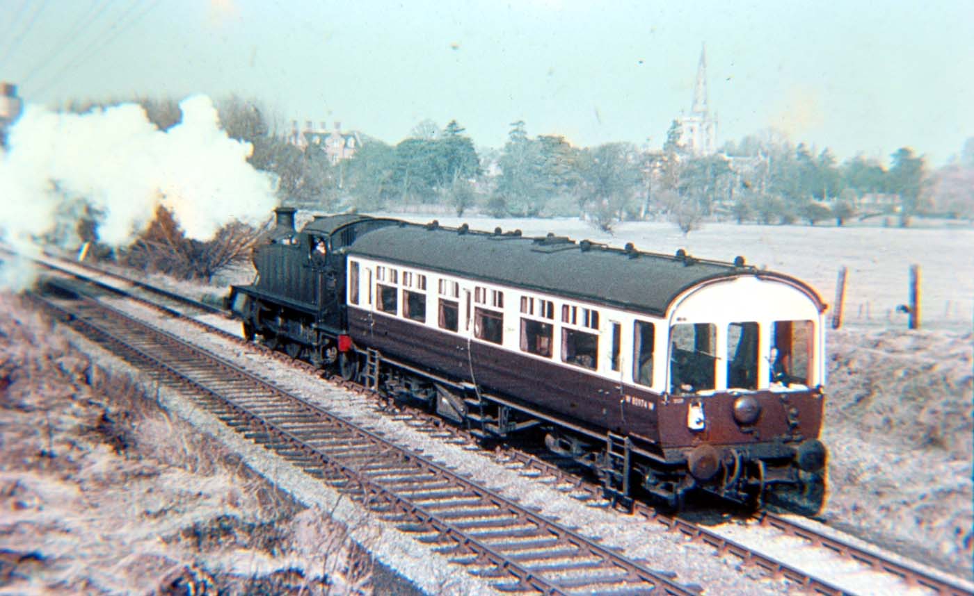 An unidentified ex-GWR 2-6-2T locomotive propels an ex-GWR Inspection Saloon No 80974  towards Clifford Sidings