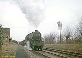 Ex-LMS 8F 2-8-0 No 48474 is passes through Ettington station with a down mineral train on 20th February 1965