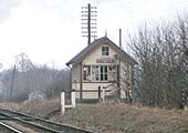 A colour close up showing the defunct Ettington Signal Box and Lamp Room on 20th February 1965