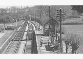 Close up showing the Kineton end of Ettington station with the up starter signal pulled'off' and the signal box on the right