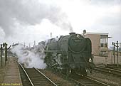 BR 9F 2-10-0 No 92247 passes through the now demolished ex-SMJ Fenny Compton station with an eastbound freight