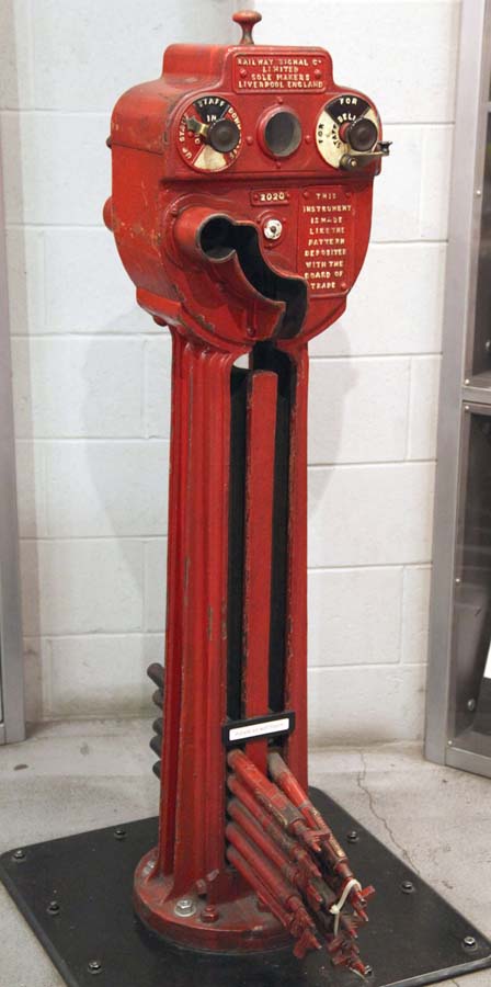 Ex-LMS 4F 0-6-0 No 44061 exchanges the token with the signalman from Clifford Sidings Signal Box