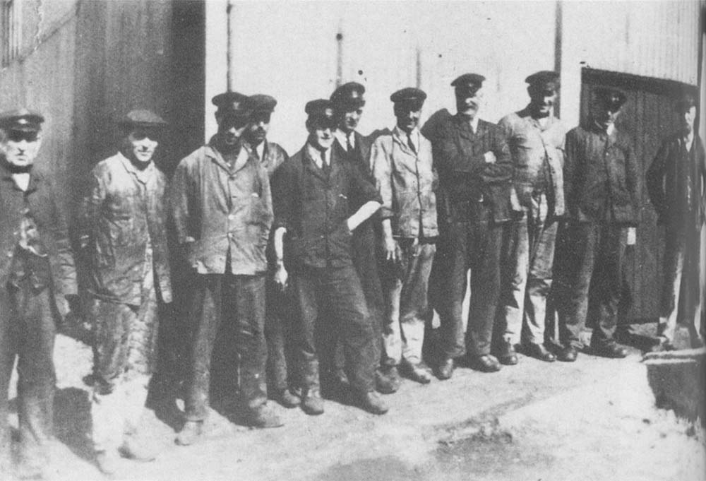 A number of SMJ drivers and shed personnel pose for the camera outside Stratford on Avon shed