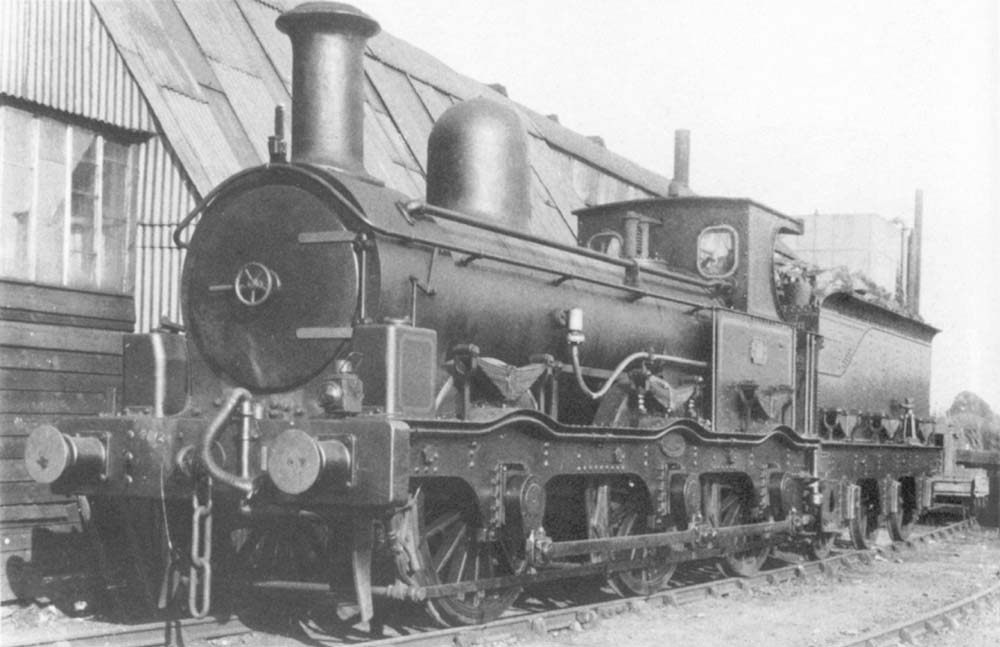 Ex-E&WJR 0-6-0 No 11 is seen in its SMJ livery standing on the back road behind Stratford on Avon shed