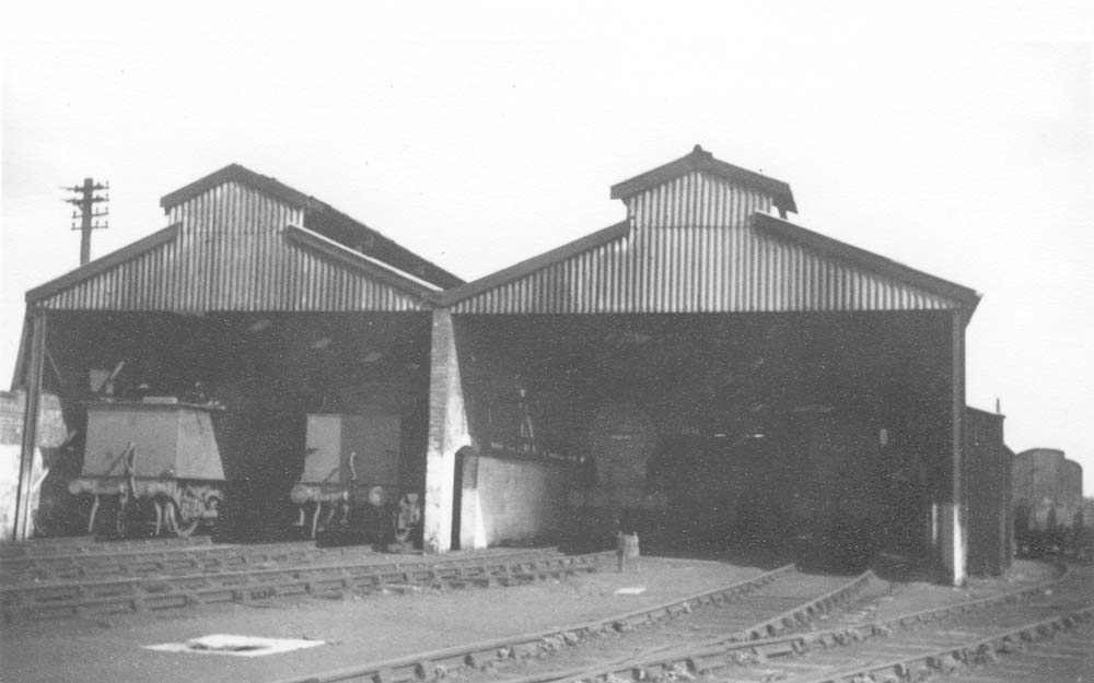 View of Stratford on Avon's four road shed showing locomotives inside the shed and the siding alongside the outer wall