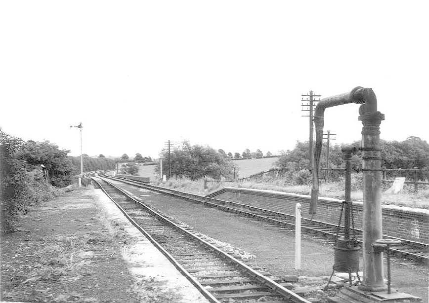 Looking East showing the sole remaining water crane complete with enclosed brazier to ward off frost on 18th August 1962