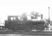 Ex-E&WJR 2-4-0T No 5, in its SMJ livery, standing on the road outside Stratford upon Avon shed