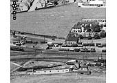 An aerial view of the westerly approach to Stratford Old Town station, goods yard and shed on 23rd June 1952