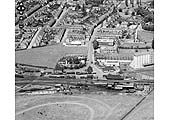 An aerial view showing the approach via New Street to Stratford Old Town station, goods yard and shed on 23rd June 1952