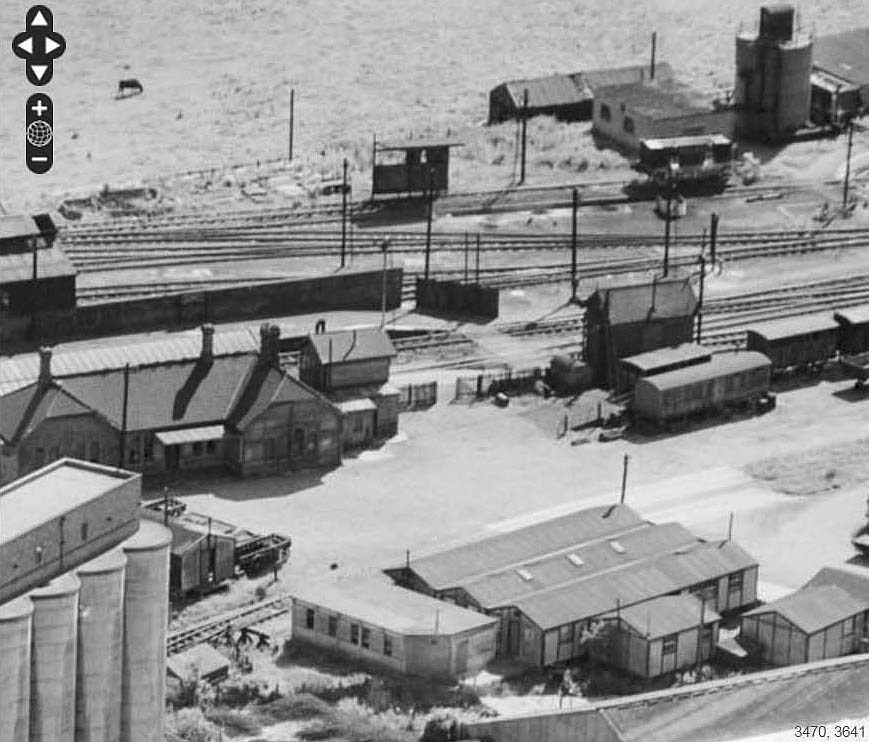 Close up showing the outside of the passenger station and the coaling stage outside the shed on 23rd June 1952