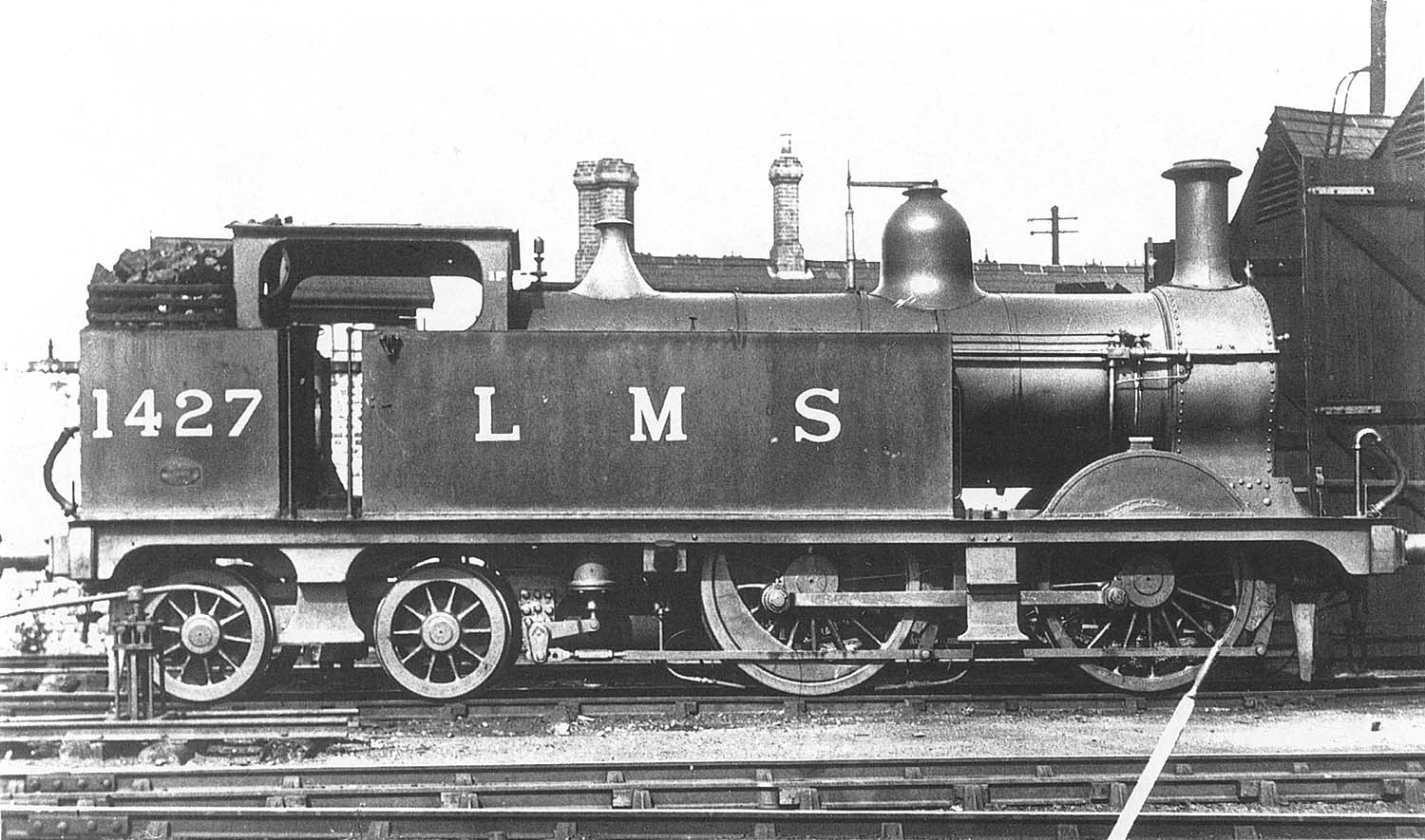 Ex-MR 0-4-4T No 1427 stands coaled and fully serviced outside the shed ready for the following morning's turn