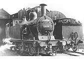 Ex-MR 0-4-4T No 1418 stands outside the original shed structure after the discontinuation of the Ro Railer service in 1932