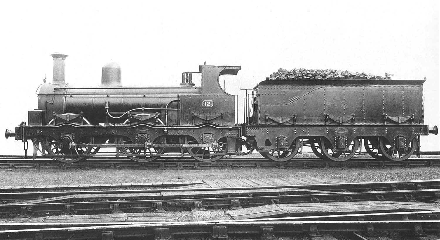 E&WJR 0-6-0 No 12 with 'outside frames' is stabled fully coaled and watered outside Stratford upon Avon shed