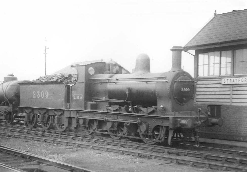 LMS 0-6-0 No 2309, formerly E&WJR No 16, passes Stratford on Avon's new signal box on 20th February 1925