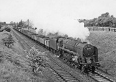 British Railways Standard Class 9F 2-10-0 No 92076 is seen heading an Annesley to Woodford coal train