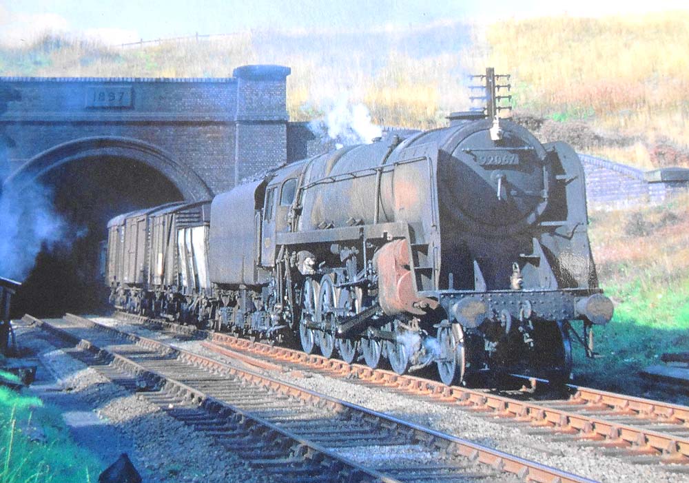 British Railways Standard Class 9F 2-10-0 No 92067 storms out of Catesby Tunnel on 10th September 1961
