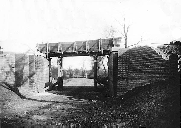 View of a temporary wooden bridge erected over the Wolfhampcote to Flecknoe Road in Warwickshire