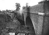 View showing how Ashlawn Road's three-arch overbridge was erected in advance of the excavation of the line