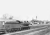 Ex-ROD 2-8-0 Class O4/8 No 63853 approaches Rugby Signal Box on a down goods service on 29th May 1950