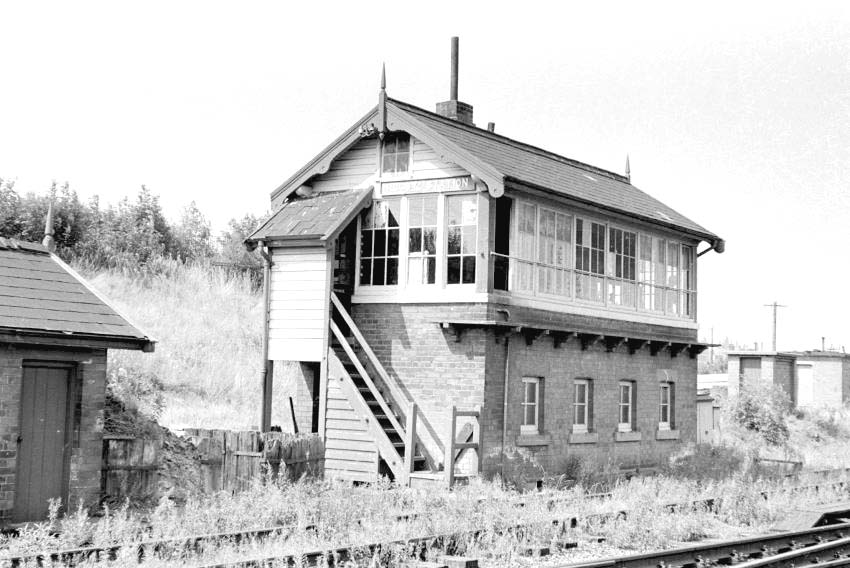 Another view of Rugby Station Signal Cabin, now surrounded by tracks with weeds growing through the ballast