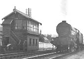 An unidentified ex-LNER V2 2-6-2 passes Rugby Cattle Sidings Signal Cabin on a Class A express service