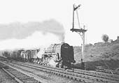 British Railways Standard Class 9F 2-10-0 No 92005 passes Signal No 33 on a down freight