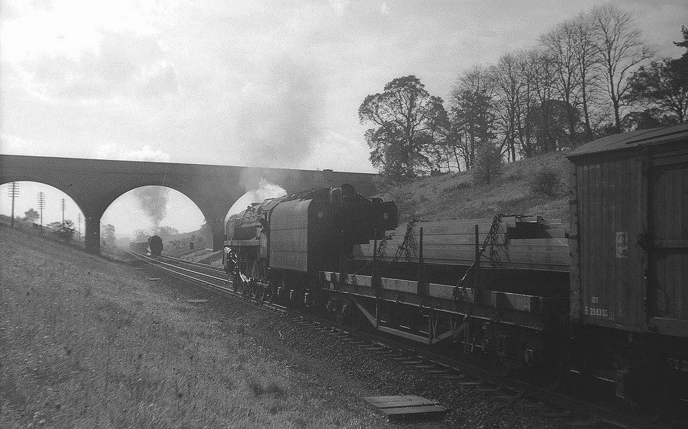 British Railways Standard Class 9Fs 2-10-0s, No 92093 and No 92074, converge south of Rugby in October 1963