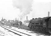 Ex-LMS 4-6-0 Rebuilt Royal Scot locomotive No 46101 'Royal Scots Grey' and ex-LMS 4-6-0 Rebuilt Royal Scot No 46126 ' Royal Army Service Corps' are seen on Friday 1st February 1963