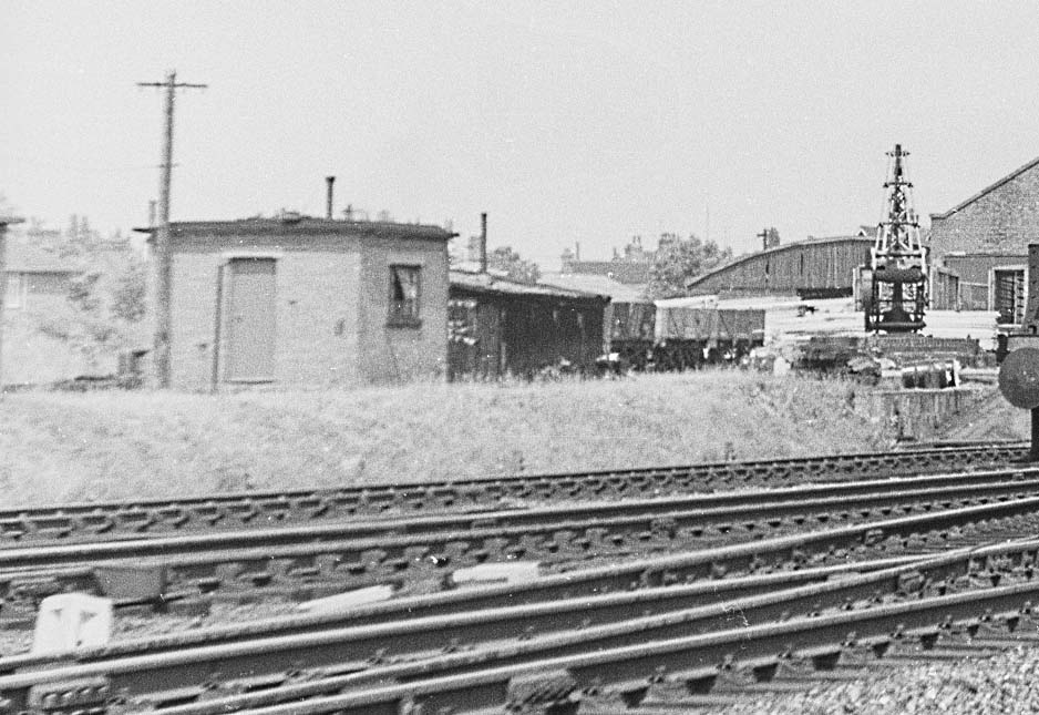 Close up showing part of Rugby Central's goods yard with the fixed hand operated crane on the right.