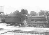 GCR 0-6-0 Class 9J No 233 is seen standing taking on water whilst at the head of an up goods train
