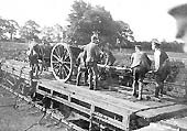 A horse-drawn Howitzer Battery is seen being loaded on to special wagons at Rugby Great Central station on 11th August 1914