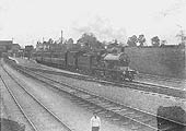 An unidentified GCR 4-4-0 hauls one of the first trains to leave Rugby's GC station when opened in 1899
