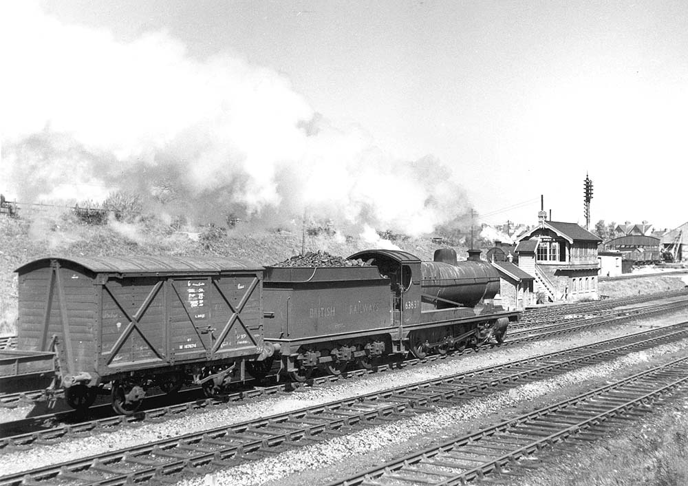 Ex-ROD 2-8-0 class O4/3 No 63639 passes through Rugby's Great Central station with a down goods train