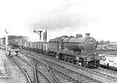 Ex-ROD 2-8-0 class O4 No 63805 is seen having crossed over the West Coast main line by the GC bridge circa 1950