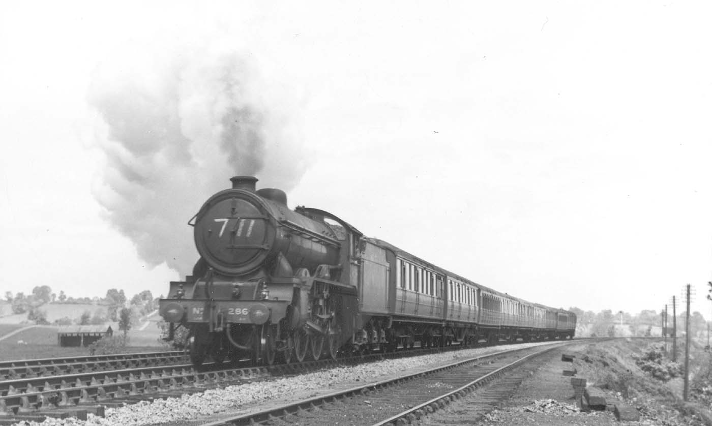LNER 4-6-0 Class B17/4 No 2862 'Manchester United' is seen working hard at the head of a down express train circa 1946