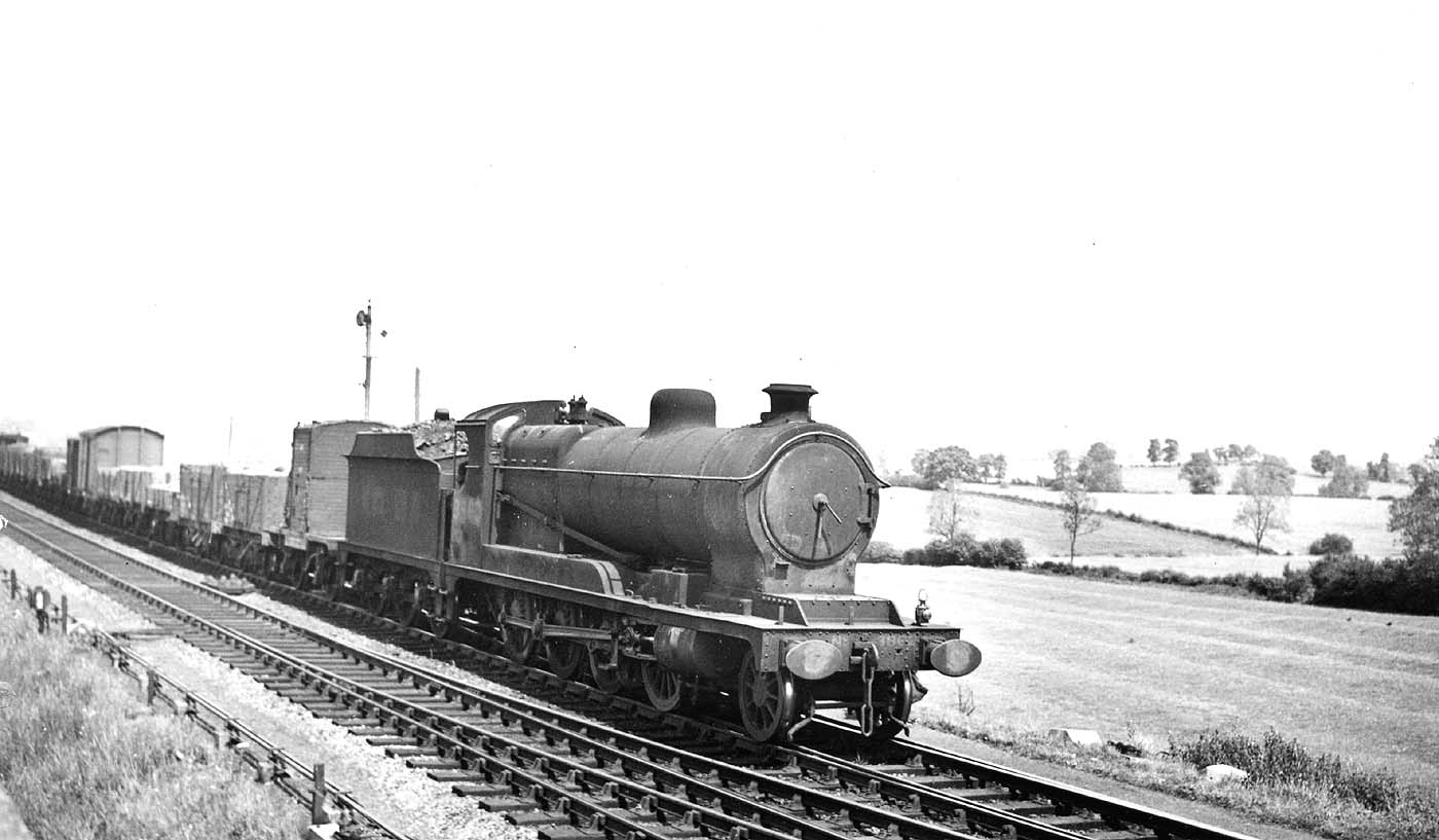 Ex-ROD 2-8-0 Class O4/3 No 3862 is seen at the head of a long freight service in June 1948