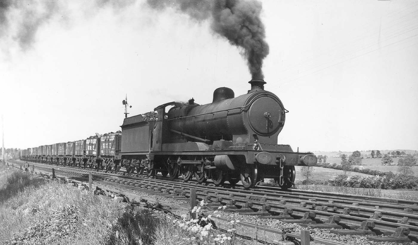 Ex-ROD 2-8-0 Class O4/3 No 6316 is seen working hard at the head of a long coal train circa 1946