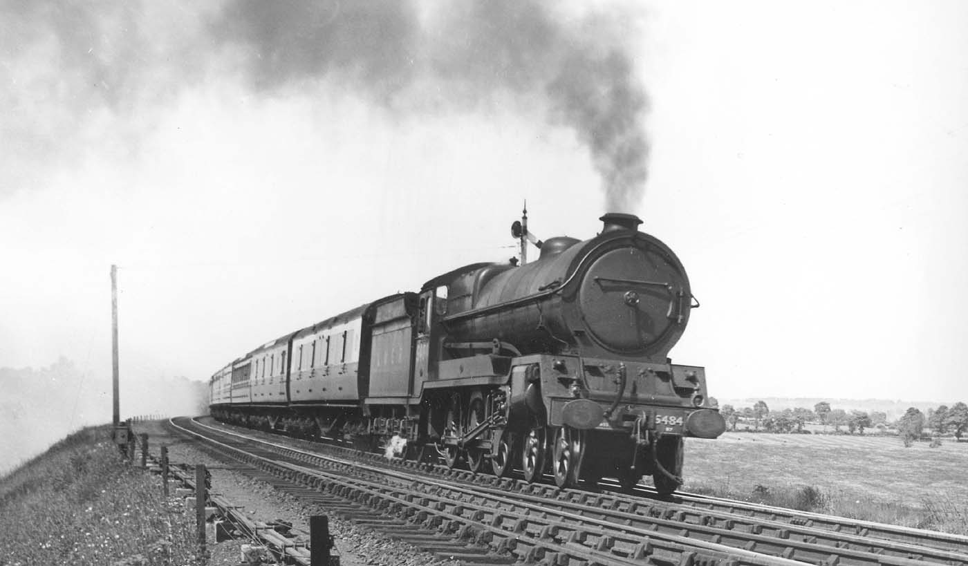 LNER 4-6-0 Class B7 No 5484 workshard at the head of a down express shortly before World War Two