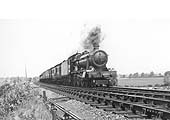 Ex-GWR 4-6-0 Hall Class No 6990 'Witherslack Hall' heads a down express during the 1948 locomotive exchanges