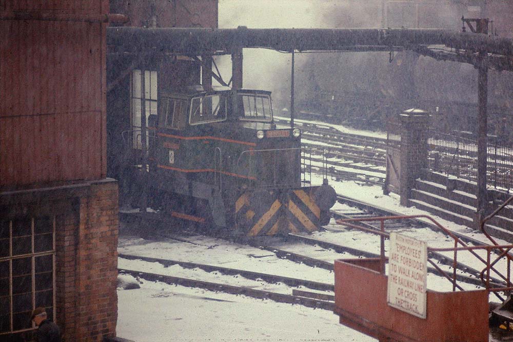 Hunslet diesel-hydraulic 0-4-0, Works No 6982, 'Longbridge' stands outside one of the complex's three sheds