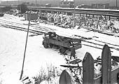 A lorry is seen to be unloaded at the Bromford Lane end of the exchange sidings during the Winter of 1962