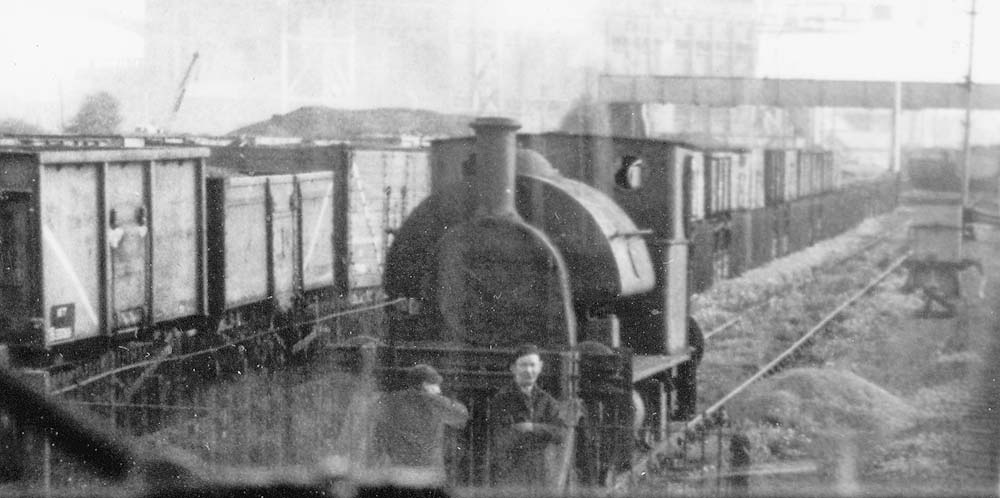 Close up showing an unidentified Bagnall 0-4-0ST locomotive paused between duties at Coventry Gasworks
