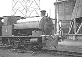 One of Coventry Gas Works' little four-wheeled Bagnall locomotives stands adjacent to one of the water towers