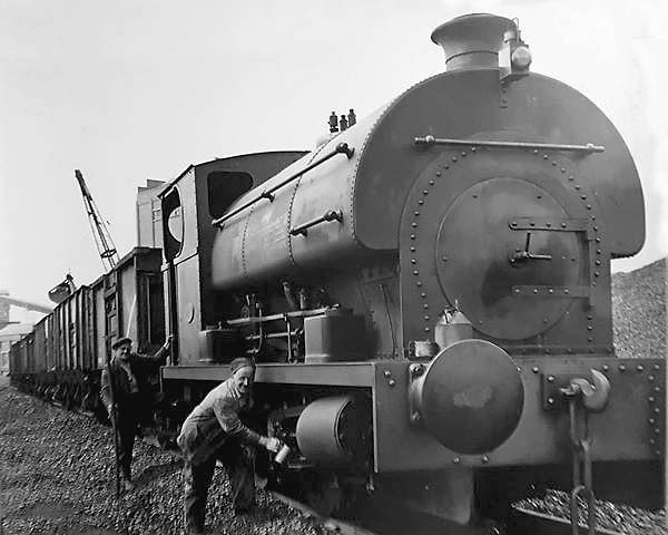 Coventry Gas Works: John Shaw seen with his fireman Snowy carrying out ...